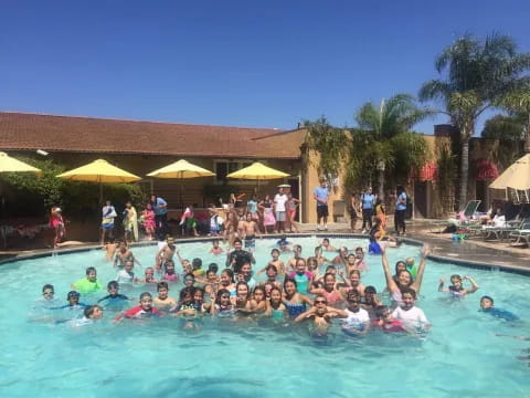 a group of people in a pool