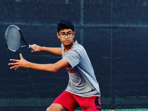 a person playing tennis