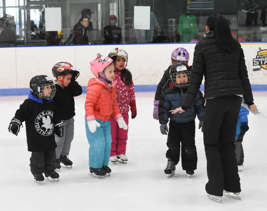a group of kids on ice