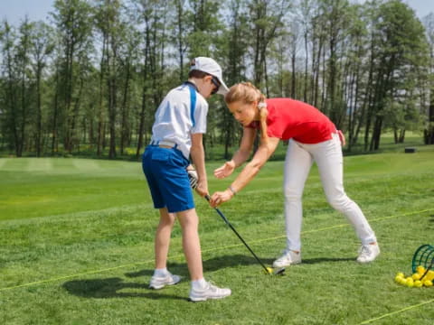 a couple of men playing golf