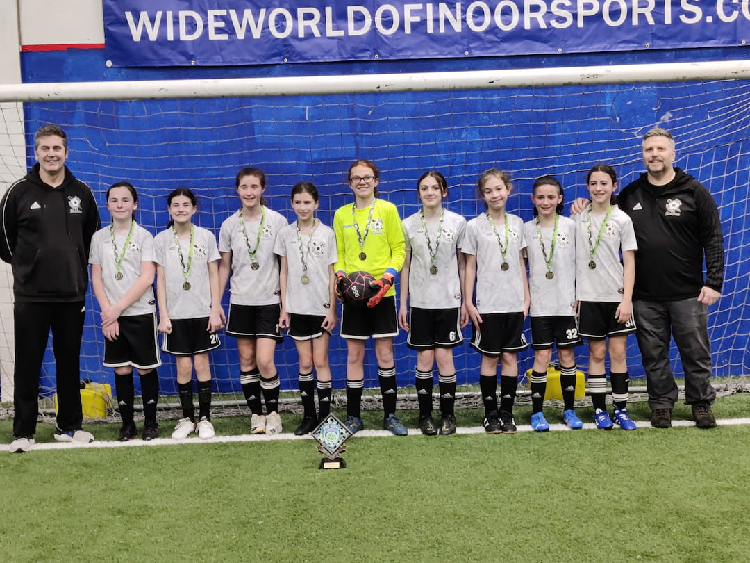 a group of people posing for a photo