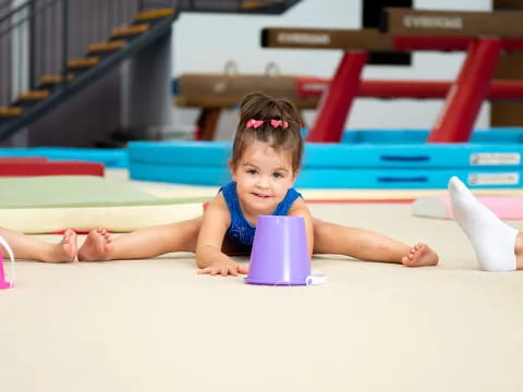 a baby lying on the floor