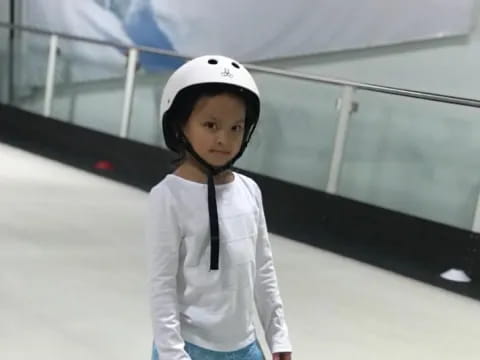 a girl wearing a helmet
