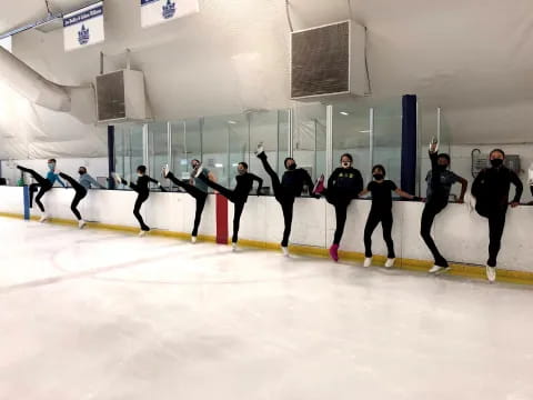 a group of people ice skating
