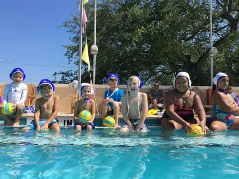 a group of people in a pool