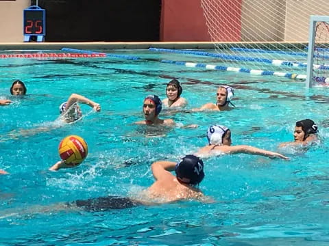 a group of people playing water polo