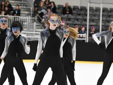 a group of women wearing clothing