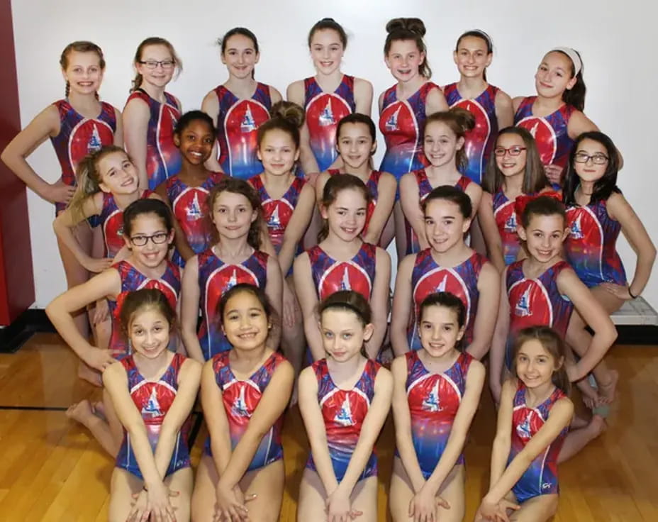 a group of girls posing for a photo