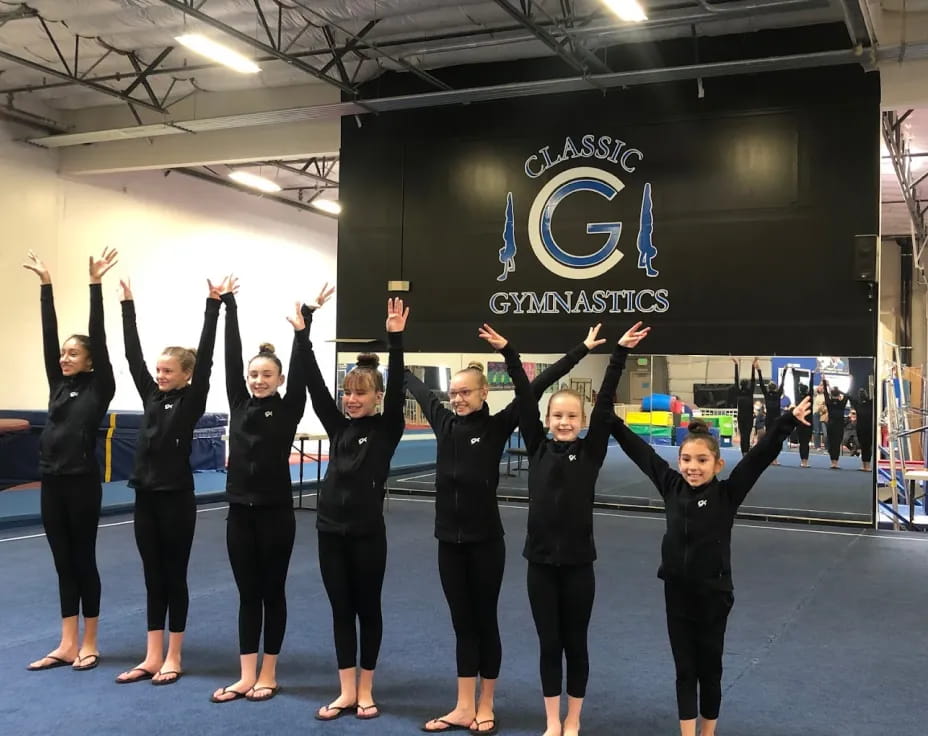 a group of women in black