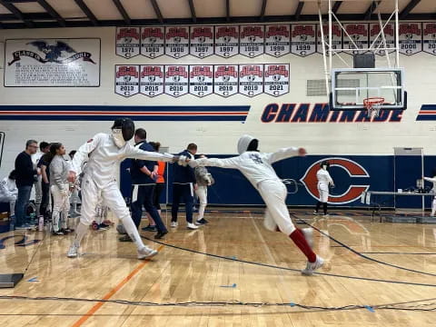 a group of people in a gym