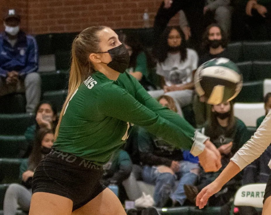 a person in a green shirt