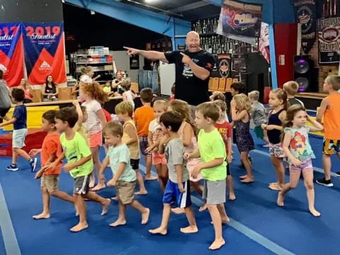 a group of children in a gym