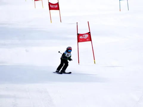 a person skiing on the snow