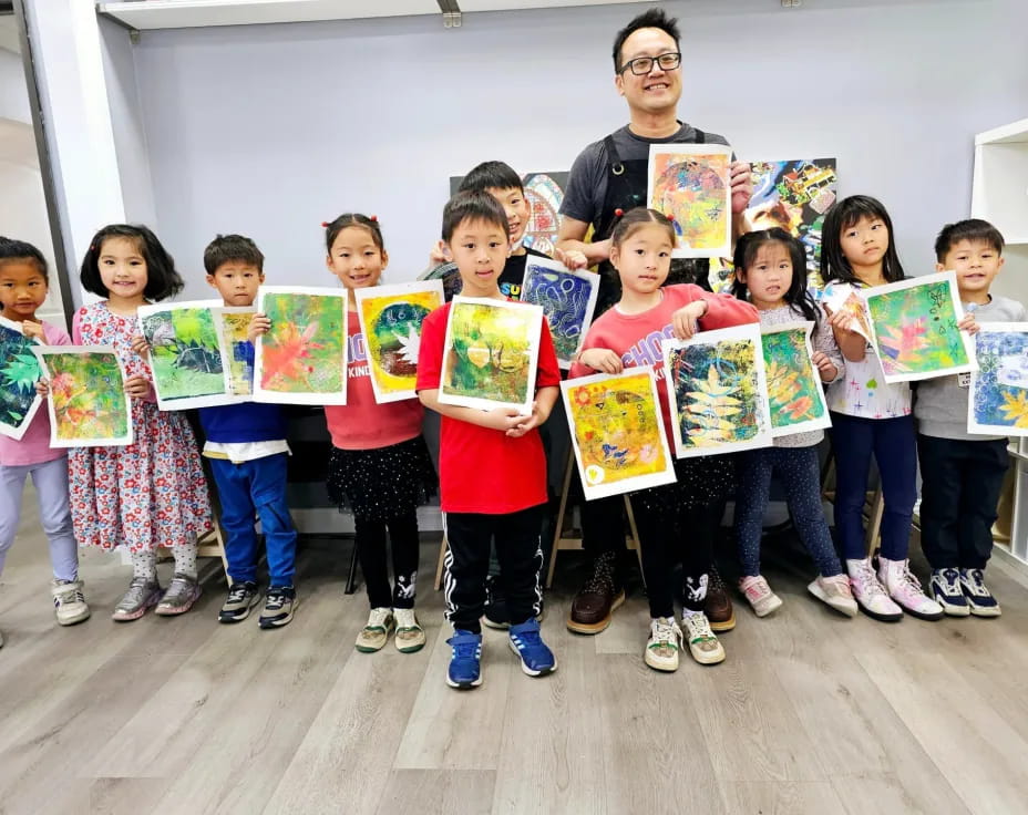a group of children holding books
