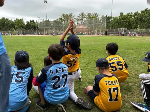 a group of kids in a field