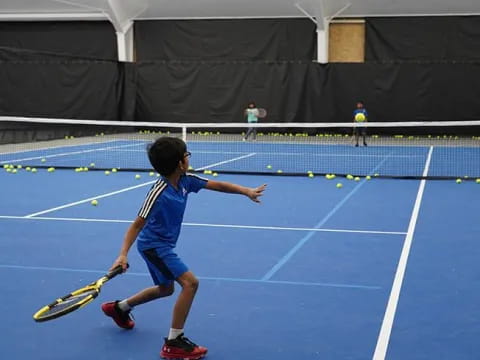 a man playing tennis