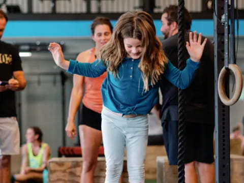 a group of people lifting weights