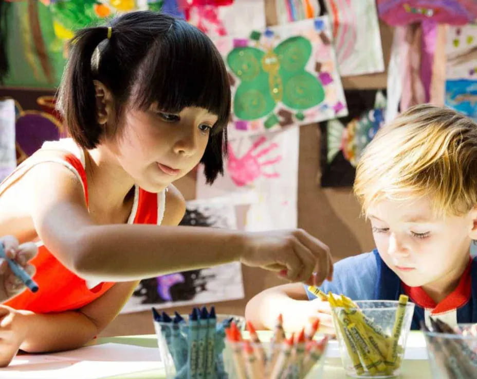 a group of children in a classroom