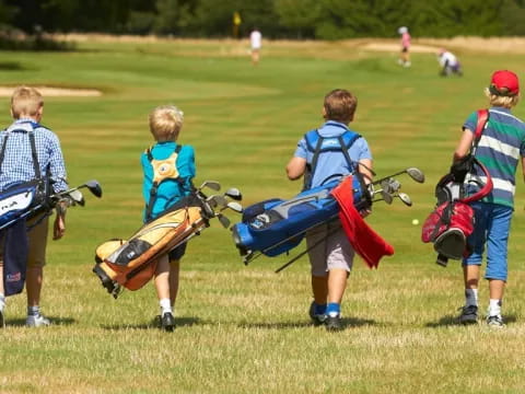 a group of kids playing with a toy helicopter