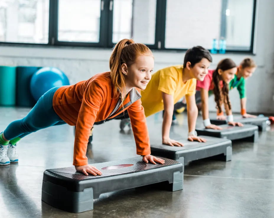 a group of children exercising