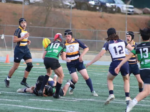 a group of people playing rugby