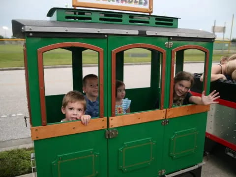 a group of children on a train