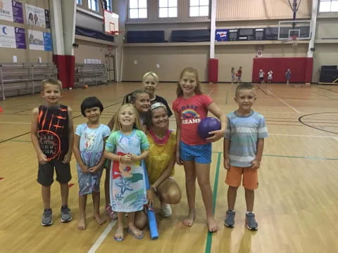 a group of children posing for a photo