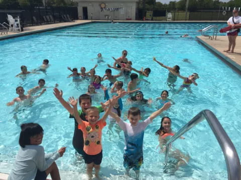 a group of people in a pool