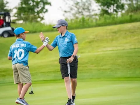 a man pointing at another man
