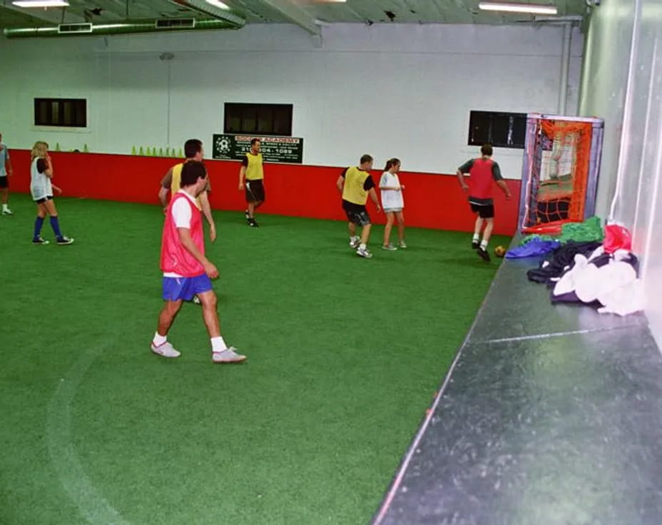 a group of people playing a sport