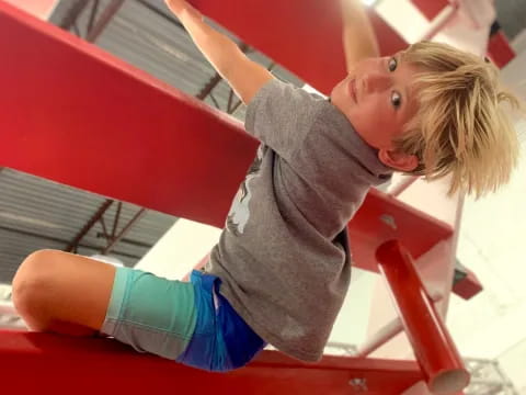 a person on a red bench