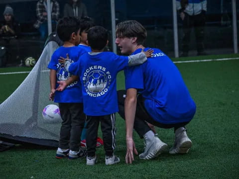 a group of boys playing football