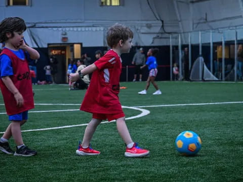 kids playing football on a field