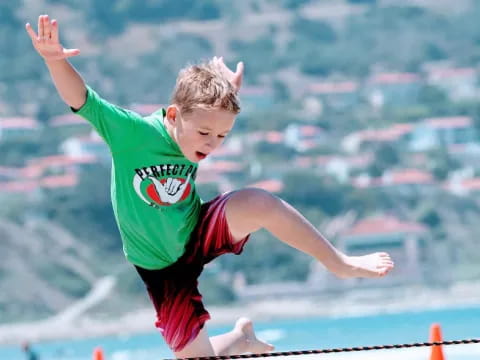 a boy jumping in the air