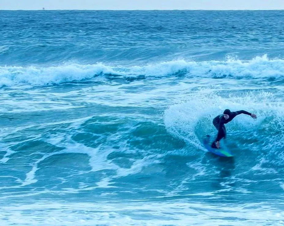 a surfer riding a wave