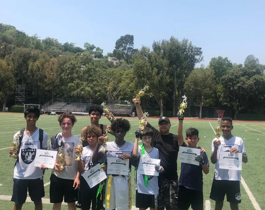 a group of people holding signs