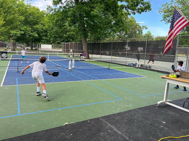 a kid playing football
