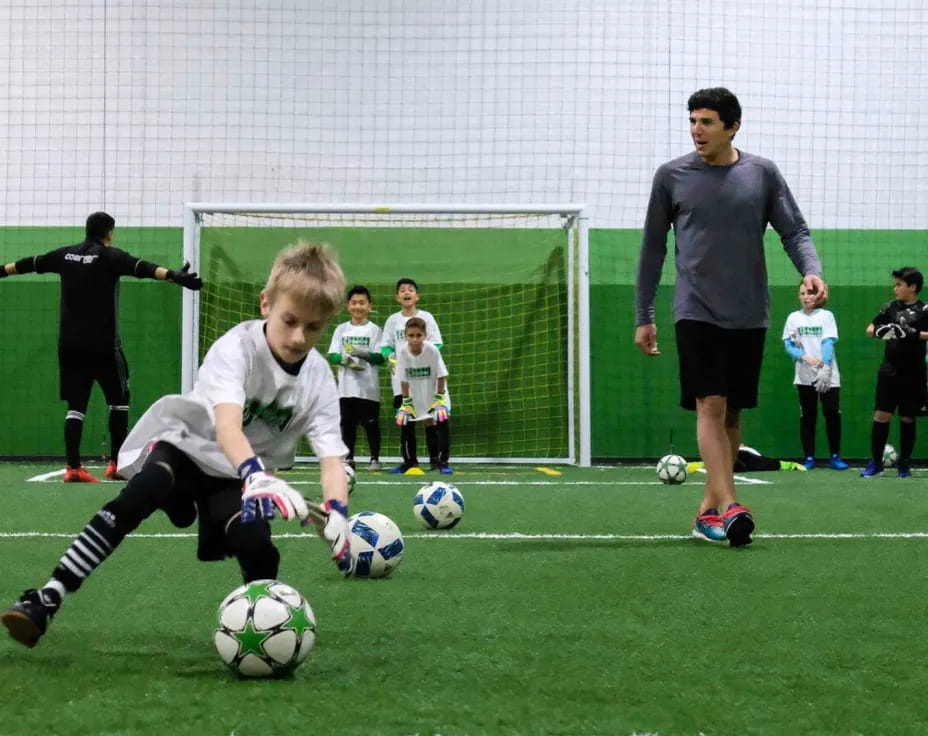 a group of kids playing football