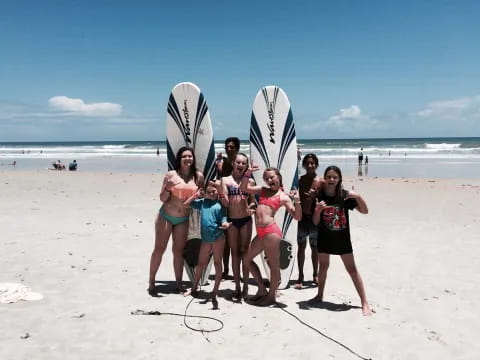 a group of women on a beach