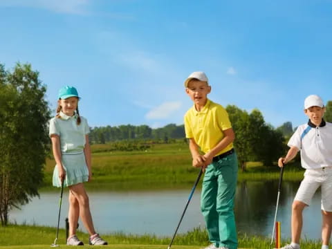 a group of people on a golf course