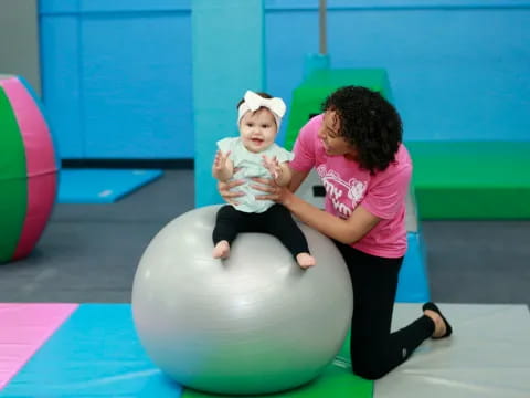 a person holding a baby