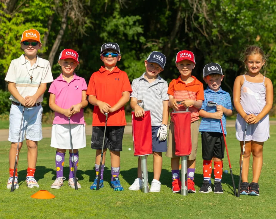 a group of kids posing for a photo