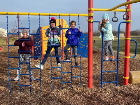 a group of kids on a playground