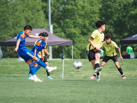 a group of men playing football