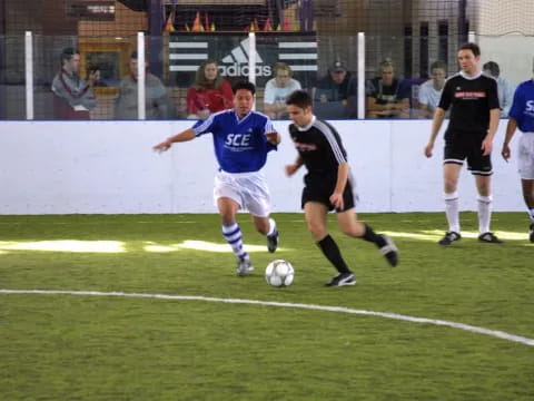 a group of men playing football