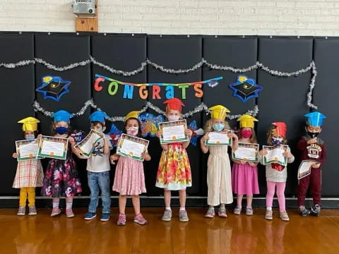 a group of children in clothing