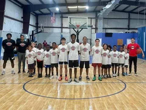 a group of people in white shirts