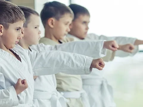 a group of children in uniform