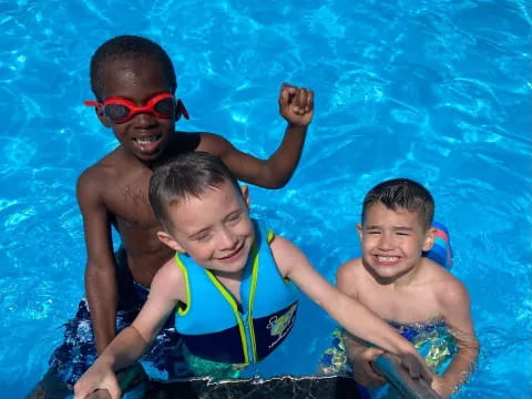 a group of boys in a pool