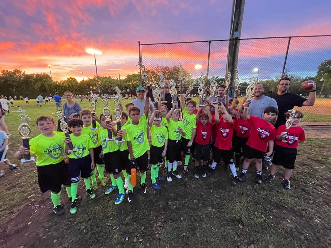 a group of kids posing for a picture